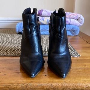 Black pointed toe heels